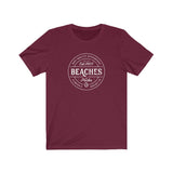 BEACHES AND PUCKS TEE