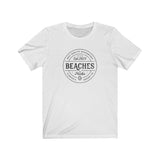 BEACHES AND PUCKS TEE