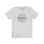 BEACHES AND PUCKS TEE