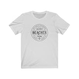 BEACHES AND PUCKS TEE