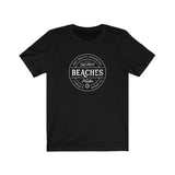 BEACHES AND PUCKS TEE